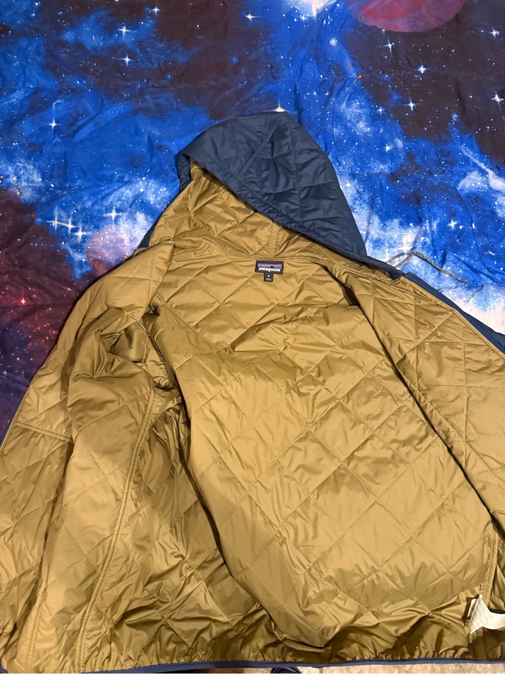 Patagonia Quilted Hooded Bomber Jacket in Navy with Tan Lining - Picture 4 of 4